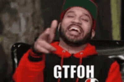 Man In Red Hoodie And Green Hat Pointing Says Gtfoh GIF