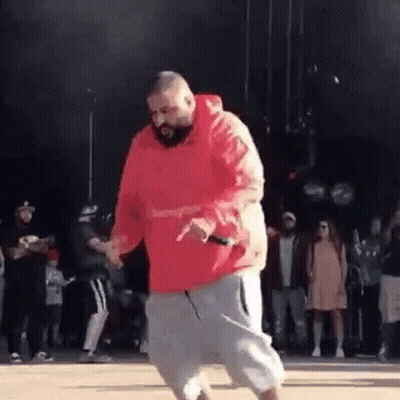 Man In Red Hoodie Dancing In Front Of Crowd GIF