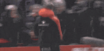 Man In Red Hoodie Helped By Man In Orange Vest GIF
