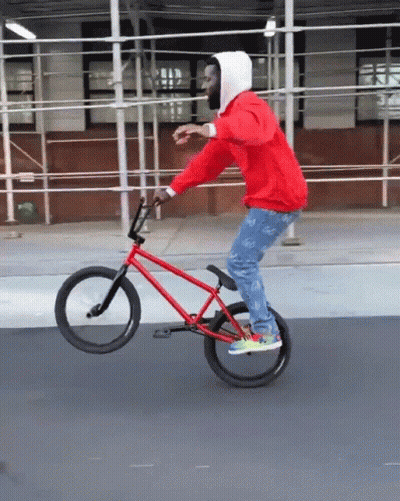 Man In Red Hoodie Riding Red BMX Bike GIF