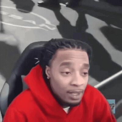 Man In Red Hoodie Sitting With Eyes Closed GIF
