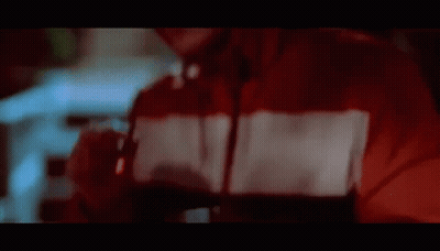 Man In Red Hoodie Smoking At Night GIF