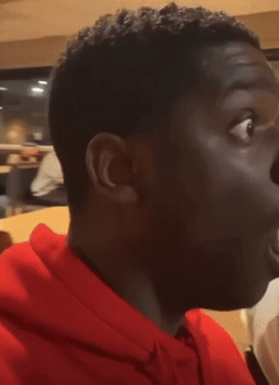 Man In Red Hoodie Surprised With Mouth Open GIF