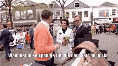 Man In Red Hoodie Talking To Another Man GIF
