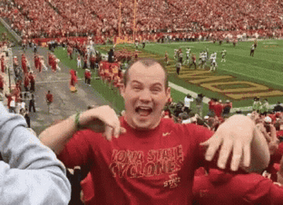 Man In Red Iowa State Cyclones Shirt At Football Field GIF