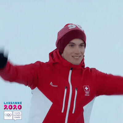 Man In Red Jacket And Red Beanie With Number 50 GIF