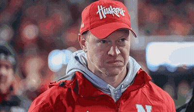 Man In Red Jacket And Red Hat With Huskers GIF