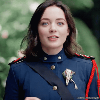 Man In Red Jacket And Tie At Desk GIF