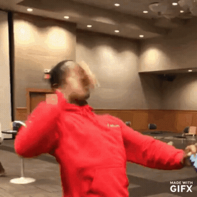 Man In Red Jacket Dancing Gifx Watermark GIF