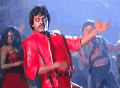 Man In Red Jacket Dancing On Stage GIF