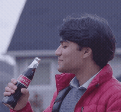 Man In Red Jacket Drinking Coca Cola GIF