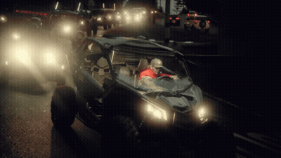 Man In Red Jacket Driving Buggy GIF