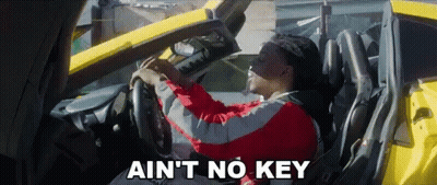 Man In Red Jacket Driving Yellow Car GIF