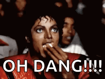 Man In Red Jacket Eating Popcorn Says Oh Dang GIF