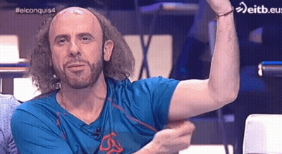 Man In Red Jacket Held By Another Person Eitb.com GIF
