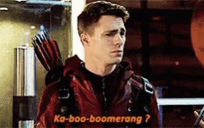 Man In Red Jacket Holding Arrow Says Ka-Boo-Boomerang GIF