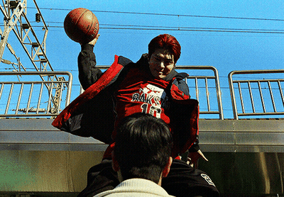 Man In Red Jacket Holding Basketball GIF