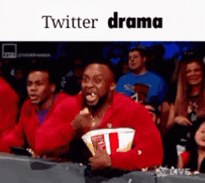 Man In Red Jacket Holding Popcorn Screaming At Twitter Drama GIF