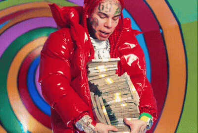 Man In Red Jacket Holding Stack Of Money GIF