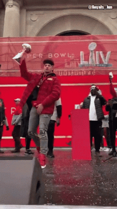 Man In Red Jacket Holding Trophy Super Bowl LIV GIF