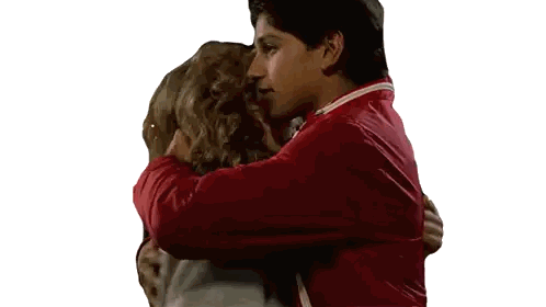 Man In Red Jacket Hugging Woman In Gray Sticker