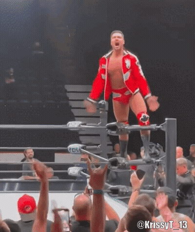 Man In Red Jacket In AEW Wrestling Ring GIF