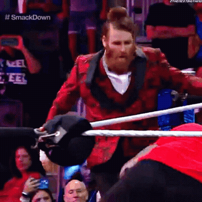 Man In Red Jacket In Wrestling Ring GIF