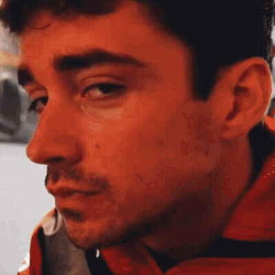 Man In Red Jacket Looking GIF