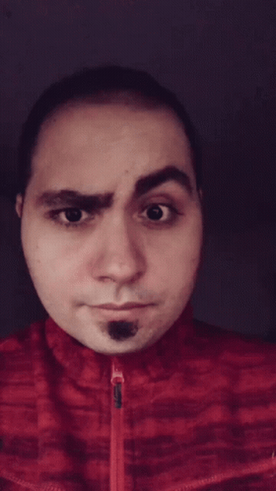 Man In Red Jacket Making Face GIF