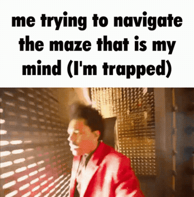 Man In Red Jacket Navigating Maze That Is My Mind GIF