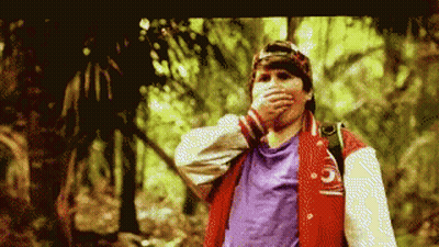Man In Red Jacket Number 5 Covering Mouth GIF