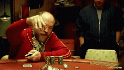 Man In Red Jacket Playing Poker Betsmove Ad GIF