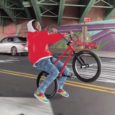 Man In Red Jacket Riding Red Bicycle GIF