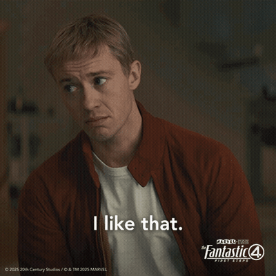Man in Red Jacket Saying I Like That in Front of Fantastic 4 Poster