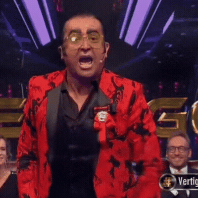 Man In Red Jacket Saying Toma Cachito E Gomajig GIF