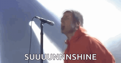 Man In Red Jacket Singing Into Microphone GIF