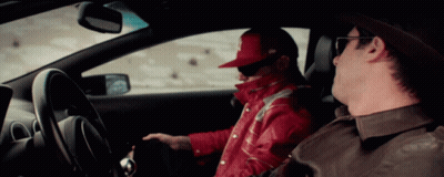 Man In Red Jacket Sitting In Car GIF