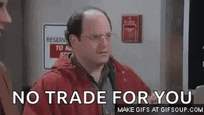 Man In Red Jacket Standing Before Fire Alarm GIF