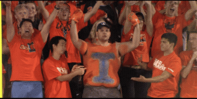 Man In Red Jacket Standing Next To Another Man GIF