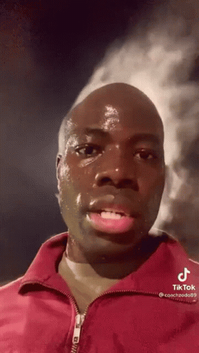 Man In Red Jacket Sweating And Crying GIF