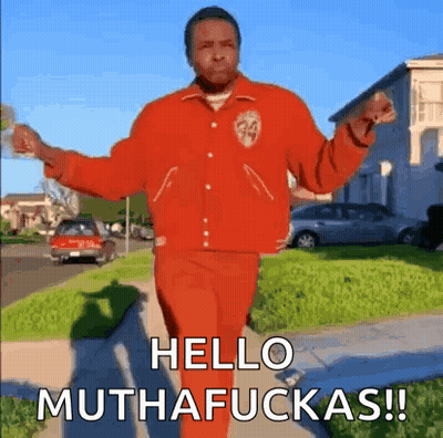 Man In Red Jacket Walking With Arms Outstretched Says Hello Muthafuckas GIF