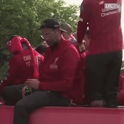 Man In Red Jacket With Champions GIF
