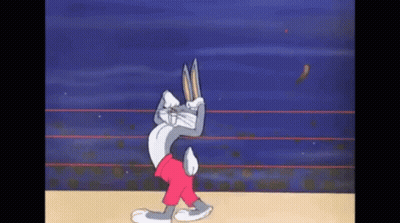 Man In Red Jacket With Letter A Kneeling GIF