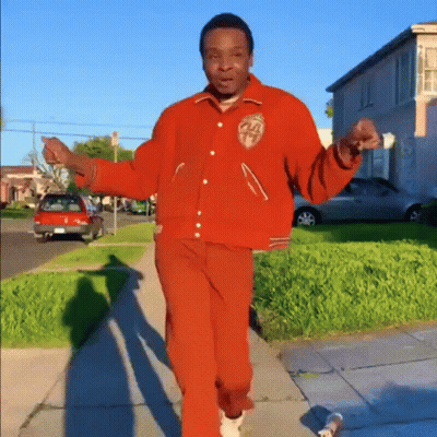 Man In Red Jacket With Letter A GIF