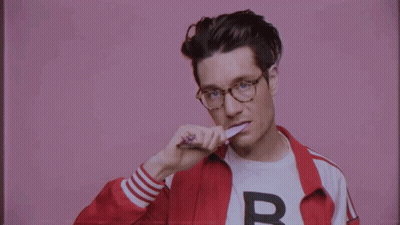 Man In Red Jacket With Letter B GIF