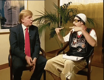 Man In Red Jacket With Letter G GIF