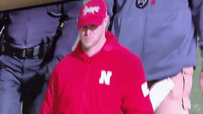 Man In Red Jacket With Letter N GIF