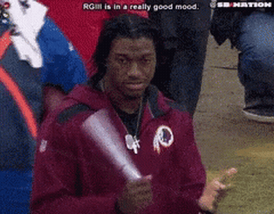 Man In Red Jacket With Redskins Logo GIF
