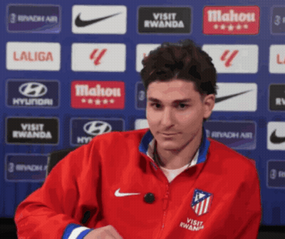 Man In Red Jacket With Visit Rwanda GIF