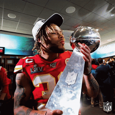 Man In Red Jersey Kissing Trophy GIF